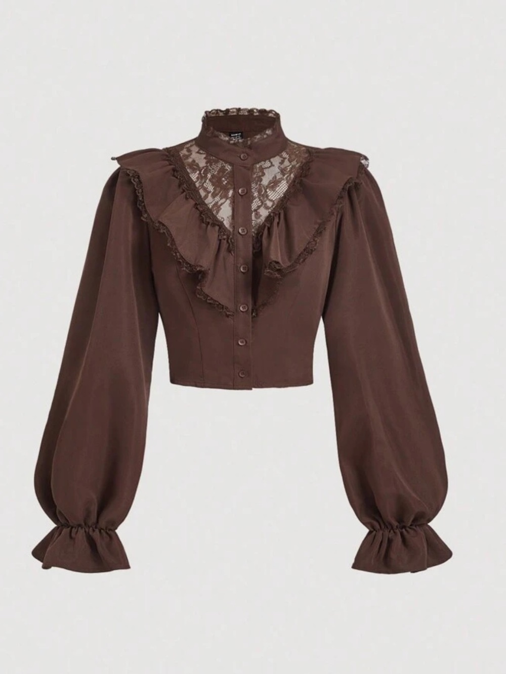 Cropped blouse with puffed sleeves and ruffle trim